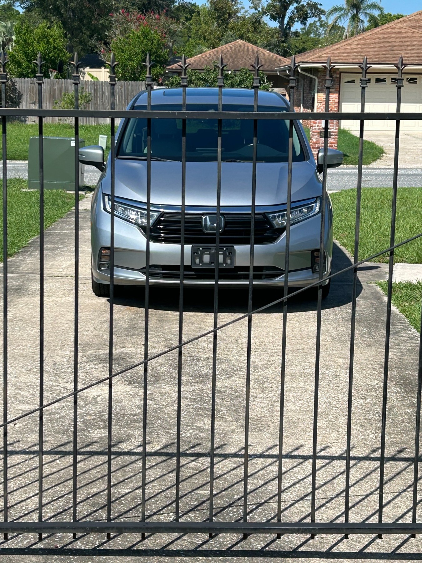 Facility passenger van parked behind the entrance gate