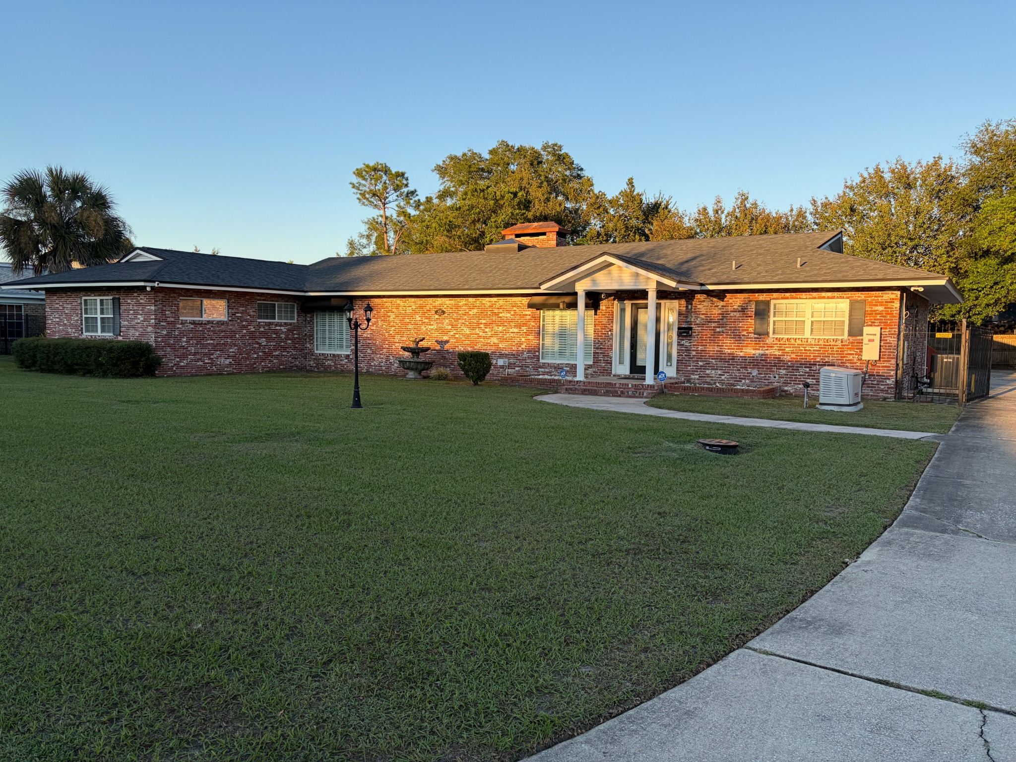 Royal Blue’s brick exterior, front lawn, and main entrance